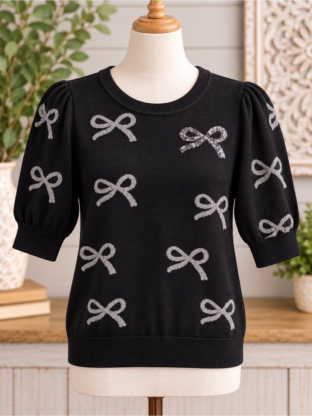 DKNY Black Puff Sleeve Knit Top with Silver Bow Motif